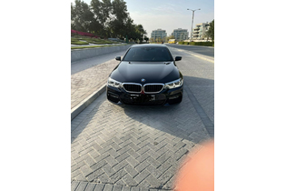 Beautiful BMW 540i blue color with M kit with extended warranty AGMC service contract