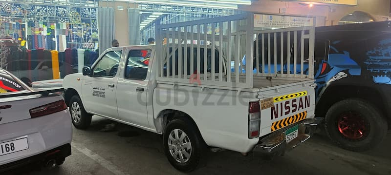 Nissan double door pickup in working condition