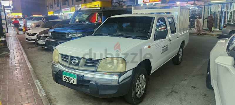 Nissan double door pickup in working condition