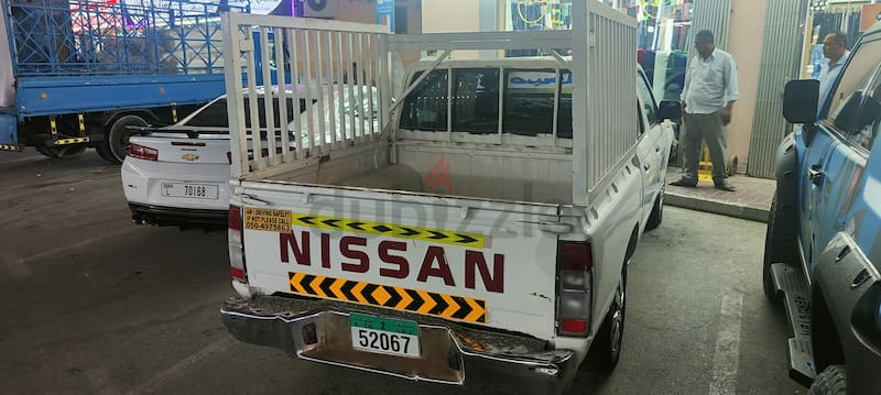 Nissan double door pickup in working condition