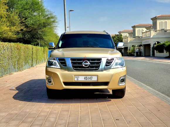 Stunning Golden Nissan Petrol 2014 LE Platinum Big Engine GCC Top Option