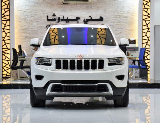 EXCELLENT DEAL for our Jeep Grand Cherokee LIMITED 4X4 ( 2014 Model ) in White Color GCC Specs