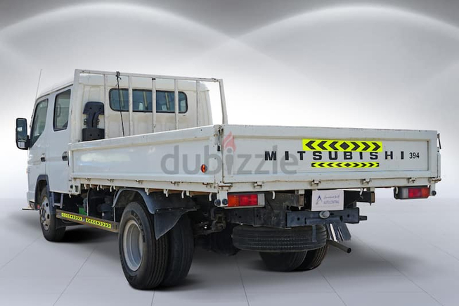 AED 965 / month | 2015 Mitsubishi Canter Open Cargo